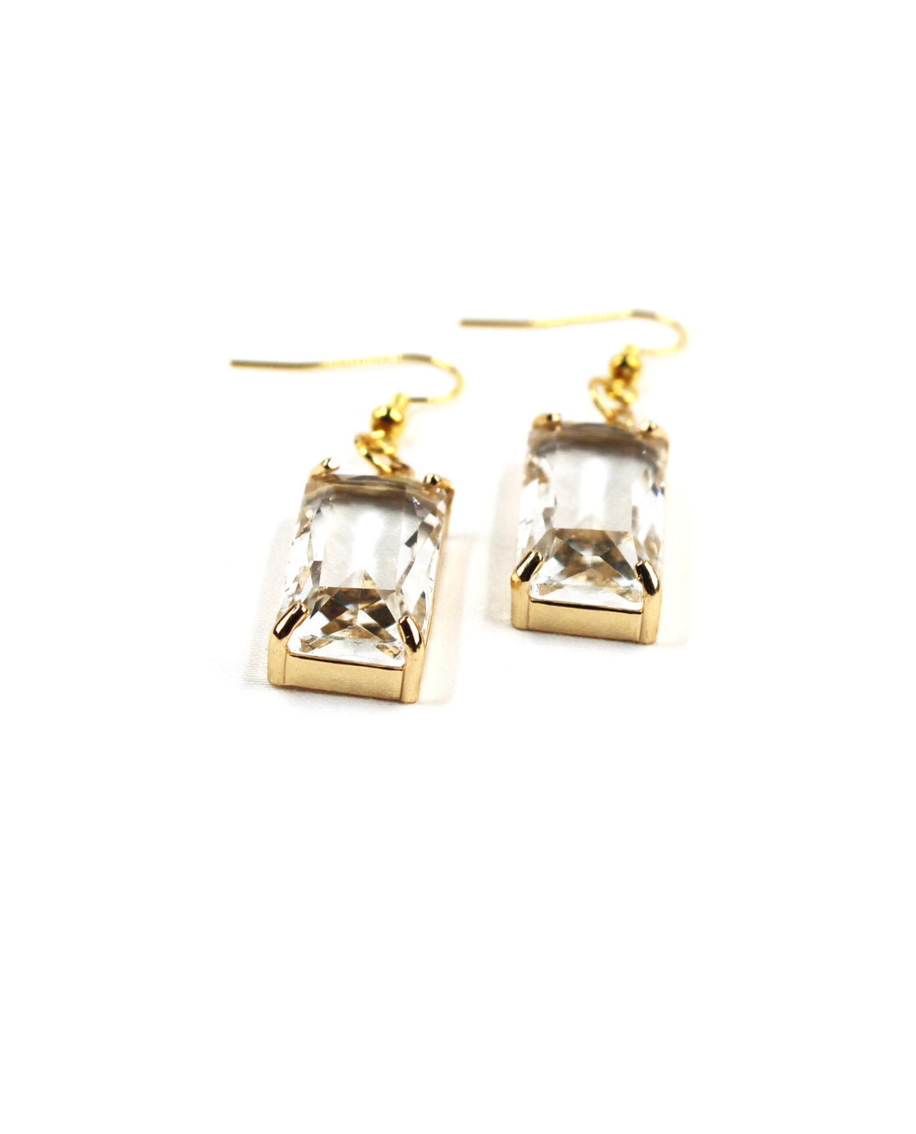 Pendientes Lumière dorados con cristal rectangular transparente