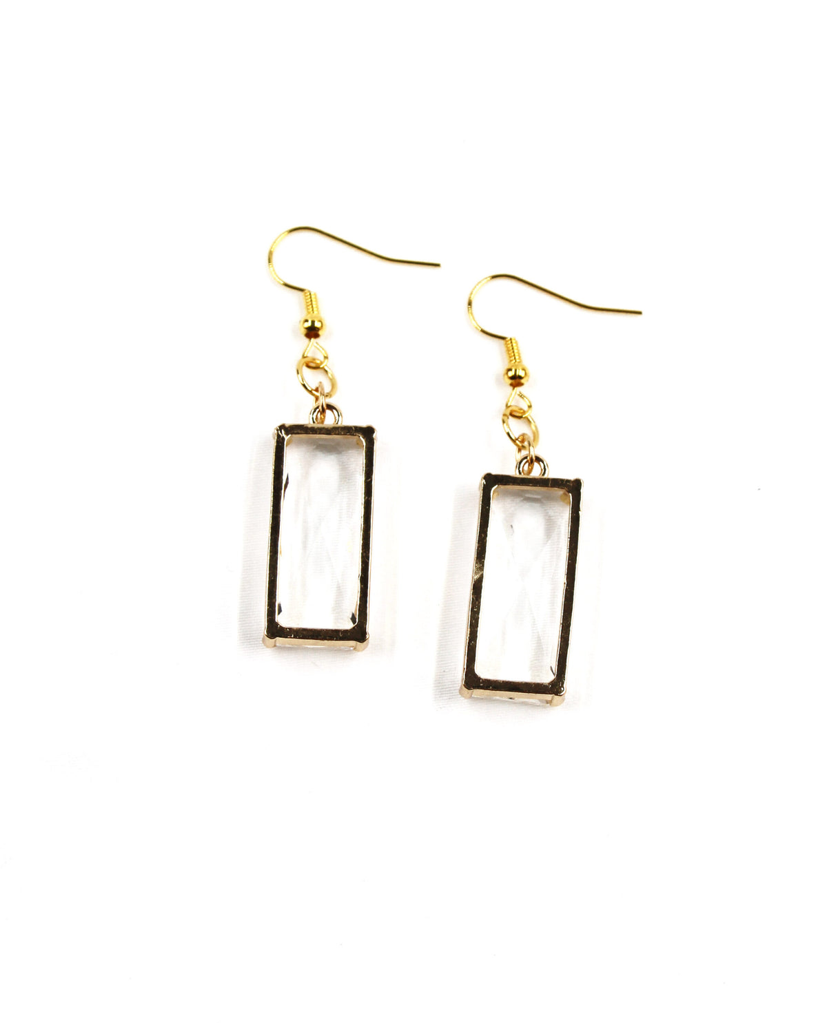 Pendientes rectangulares Lumière en tono dorado con cristal transparente